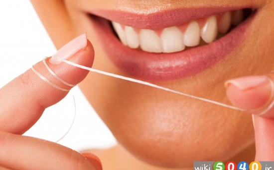 اثرات نکشیدن نخ دندان بر سلامت